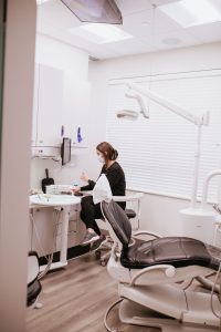 dental assistant in room